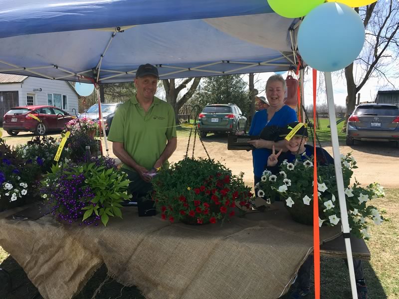 Chris and visitors at the Hanging Basket Challenge tent